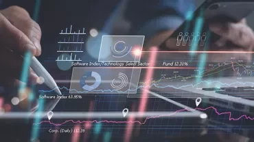 Graphiques financiers avec données numériques sur un écran.