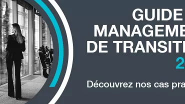 Personne regardant par la fenêtre d'un bureau moderne.