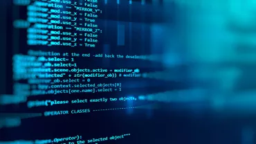 Écran d'ordinateur affichant du code source en bleu.