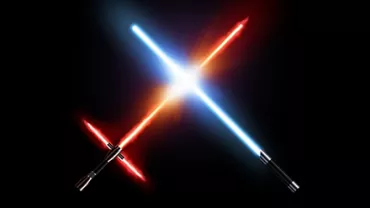 Deux sabres laser croisés, un rouge et un bleu, sur fond noir.