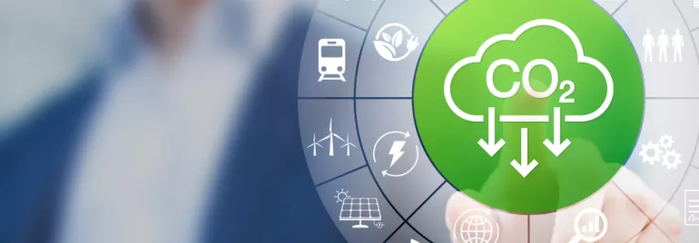 Icône de réduction de CO2 avec symboles d'énergie verte.