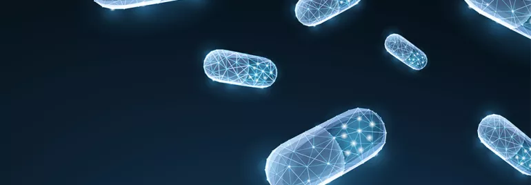 Des capsules bleues en lumière numérique flottent sur fond sombre.