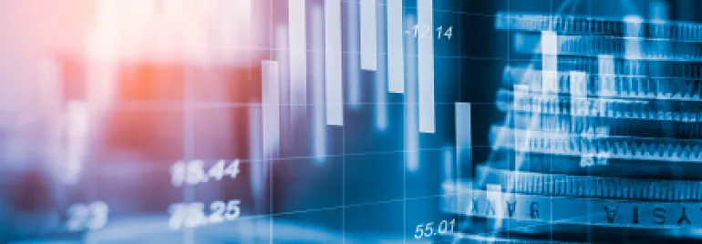 Graphique de données financières avec pièces empilées.