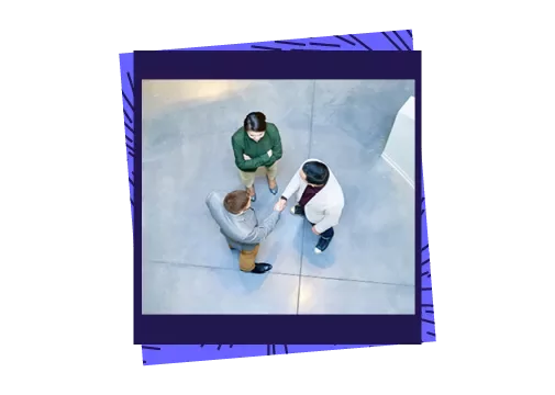 3 coworkers talking on a lobby featuring the Talent trends